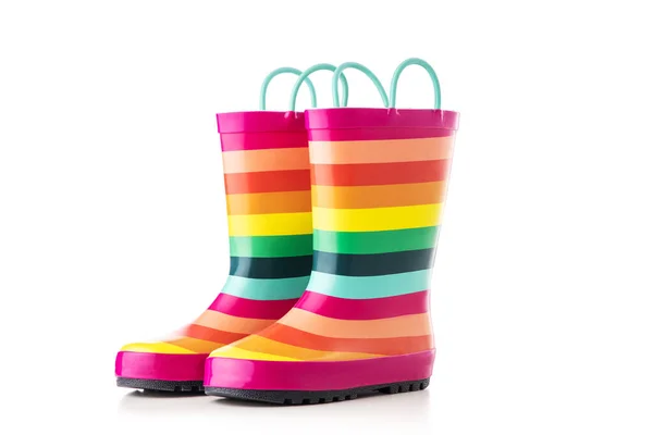 橡胶制品雨靴色彩斑斓 被白色背景隔离的儿童的脚部穿衣 — 图库照片