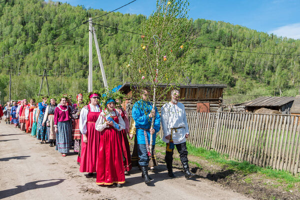 Ancient Russian rite: procession with a birch for its further sinking.
