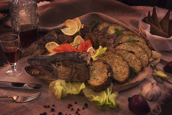 Stuffed pike with vegetables and greens. — Stock Image Stuffed pike with vegetables and greens. Stock Photo
