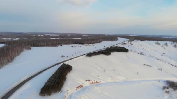 Aerial view of a road in winter landscape — Stock Video