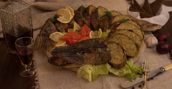 Stuffed pike with vegetables and greens. — Stock Image Stuffed pike with vegetables and greens. Stock Photo