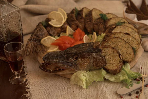 Stuffed pike with vegetables and greens. — Stock Image Stuffed pike with vegetables and greens. Stock Photo