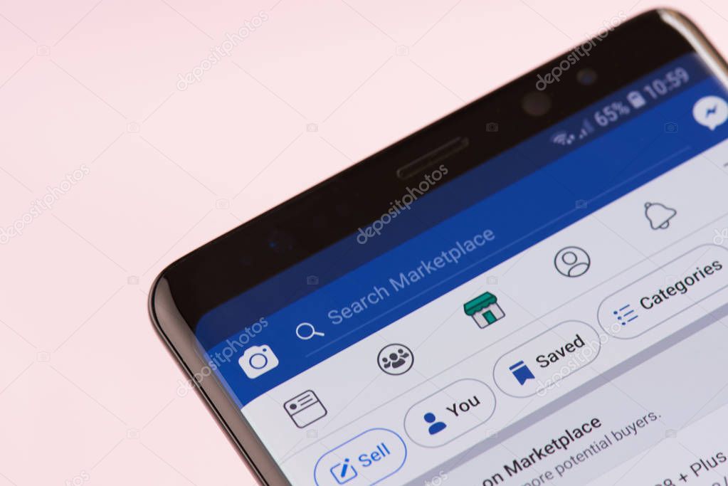 New york, USA - september 21, 2018: Facebook marketplace search bar on smartphone screen background close up view