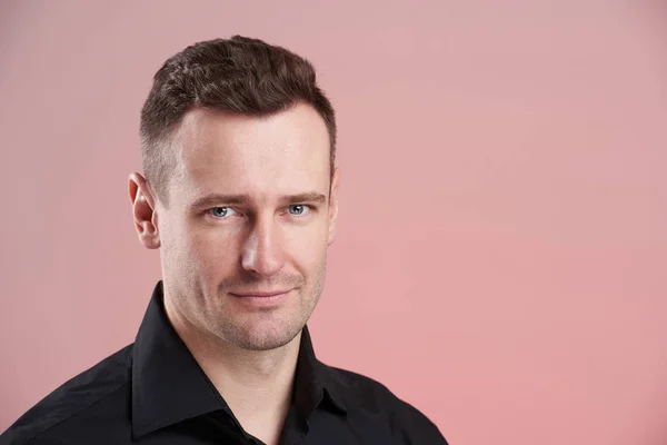 Headshot of young serious man — Stock Photo, Image