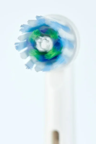 Close up of moving electric toothbrush head — Stock Photo, Image