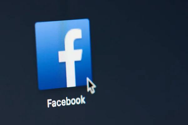 Facebook icon on screen — Stock Photo, Image