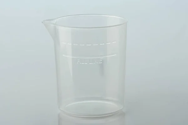 Clear empty cup with fill line — Stock Photo, Image