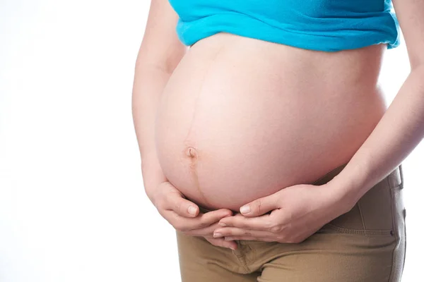 Embarazada mujer mantenga su barriga —  Fotos de Stock