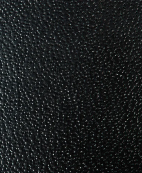 Black dotted leather texture background — Stock Photo, Image