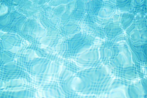 Abstracto agua azul en la piscina — Foto de Stock