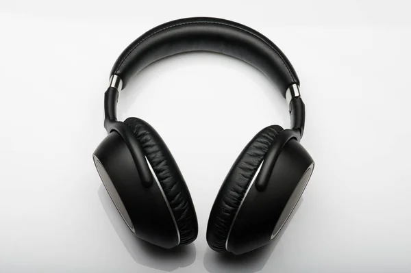 Black leather headphones above view — Stock Photo, Image