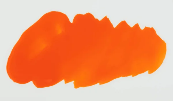 Mancha de tinta laranja isolada — Fotografia de Stock