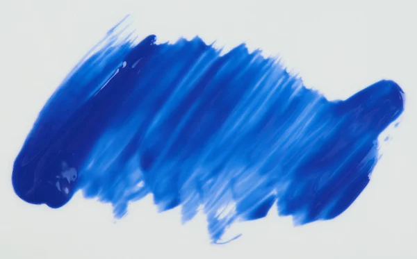 Mancha de tinta azul brilhante isolado — Fotografia de Stock