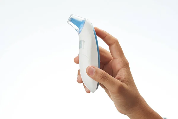 Hand holding digital thermometer — Stock Photo, Image