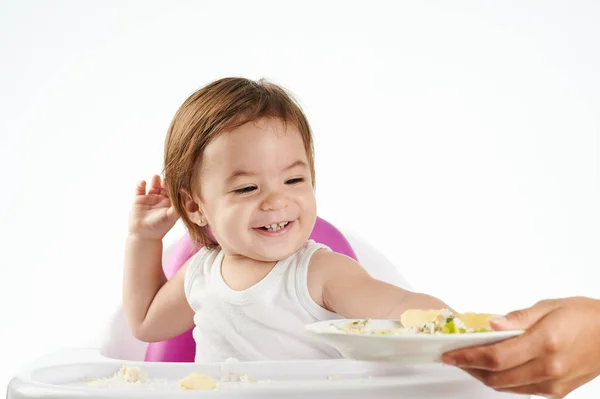 Baby girl play with food — Stock Photo, Image