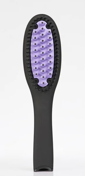 Uma escova de cabelo preto — Fotografia de Stock
