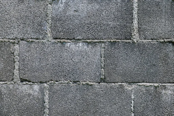 Mur solide en brique grise — Photo