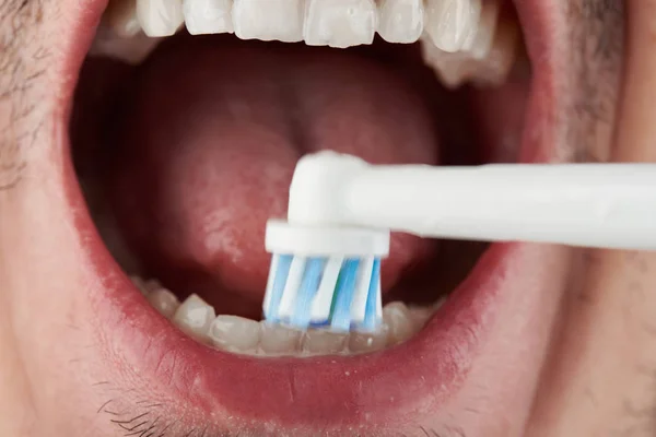 Close up of cleaning teeth