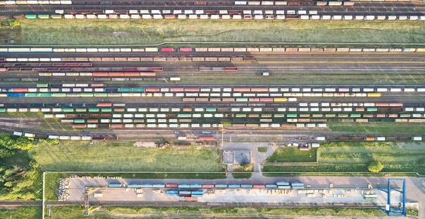 Railway station with cargo above top drone view