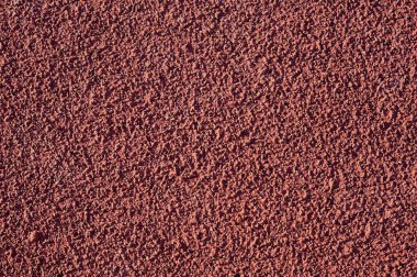 Kırmızı sert spor arenası yüzey makrosu yakın görünüm