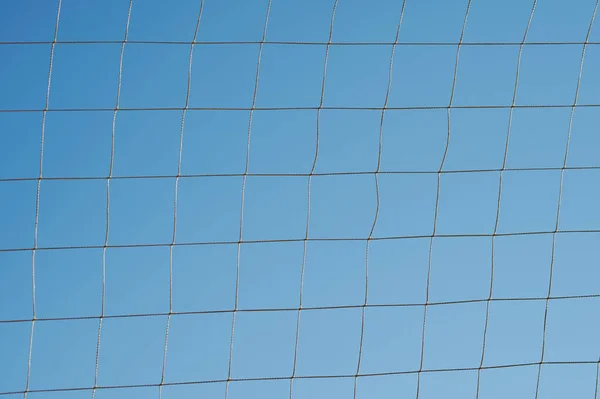 Sport rope net pattern on blue sky background