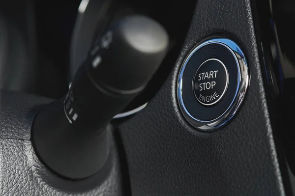 Car stop start button ignition button close up view