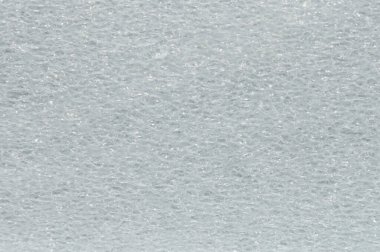 Gri sentetik kabarcık dokusu makro yakın görüntü. Kabarık arkaplan