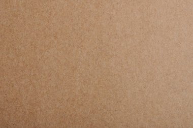 Karton bej düz kağıt arka plan makro yakın görünüm