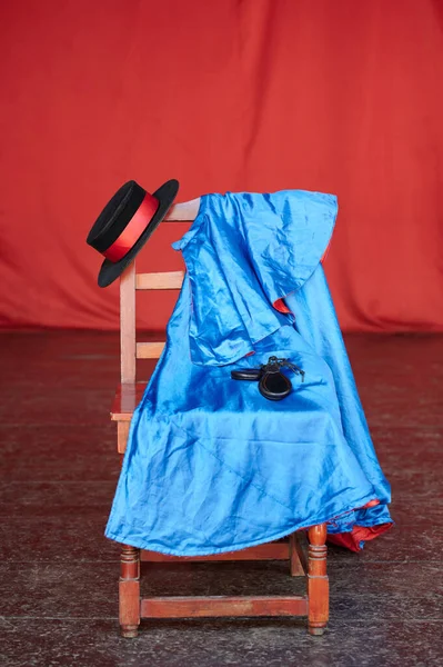 Stage for performing flamenco dance with red background