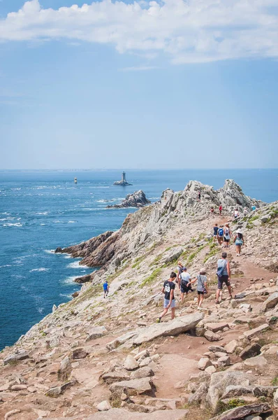 The tip of the raz in Brittany with these cliffs and its lighthouse