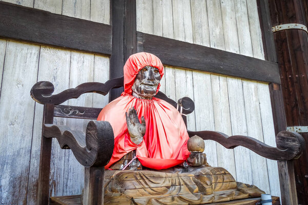 Binzuru wooden statue in Daibutsu-den Todai-ji temple, Nara, Japan