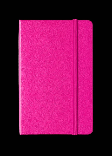 Cuaderno magenta rosa cerrado aislado en negro — Foto de Stock