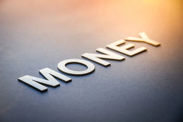 Ord pengar skrivna med vita solida bokstäver — Stockfoto