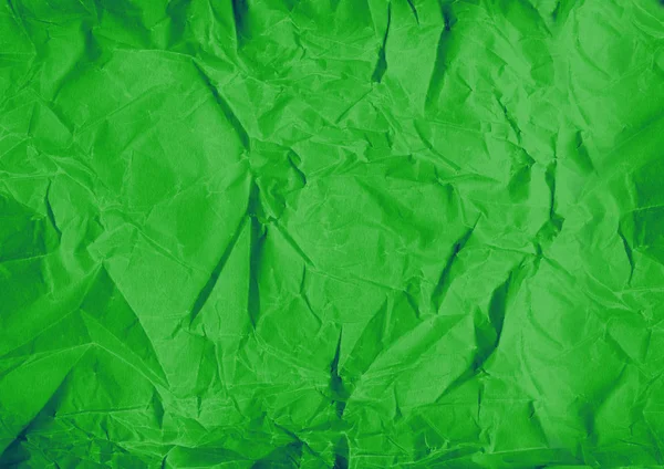 Green crumpled paper texture background — Stock Photo, Image