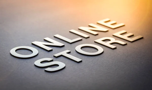 Word online winkel geschreven met witte solide letters — Stockfoto