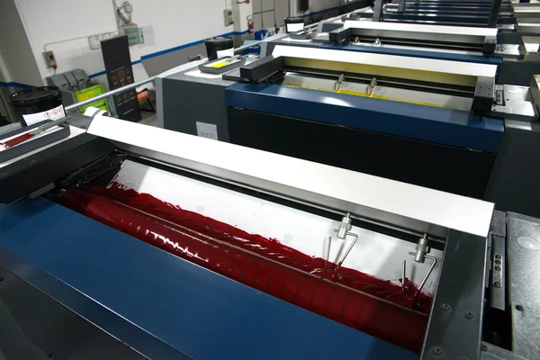 Press printing - Offset machine. Printing technique where the inked image is transferred from a plate to a rubber blanket, then to the printing surface.