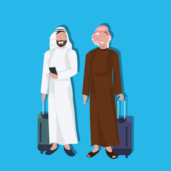伝統的な服を着て小型スーツケースを保持しているスマート フォンを使用してアラビア語ビジネスマン旅行コンセプト男性漫画文字青いアバター背景全長フラット — ストックベクタ