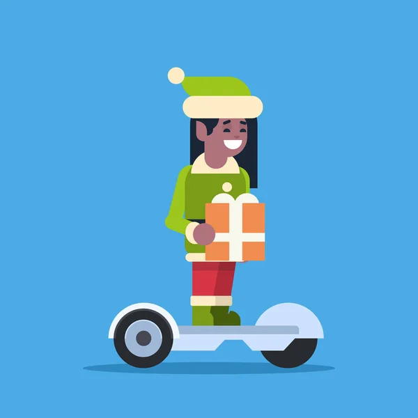 Elf girl santa claus helper ride electric scooter merry christmas holiday new year concept flat — стоковый вектор