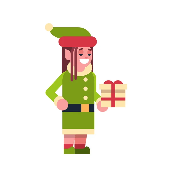 Chica elfo santa claus helper hold regalo caja regalo feliz navidad feliz año nuevo concepto personaje de dibujos animados femeninos longitud completa plana — Archivo Imágenes Vectoriales