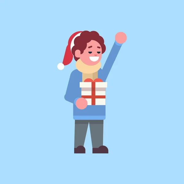 Mann trägt Winterkleidung halten Geschenkbox Geschenk frohe Weihnachten Urlaub glücklich neues Jahr Konzept männliche Zeichentrickfigur volle Länge flach — Stockvektor
