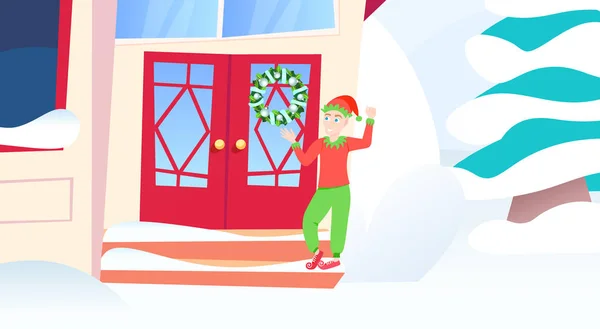 Ξωτικό αγόρι κοντά στο ξύλινο χιόνι οι cottage ευτυχισμένο το νέο έτος καλά Χριστούγεννα διακοπές διακοσμήσεις έννοια χιονισμένο έλατο επίπεδης και οριζόντιας — Διανυσματικό Αρχείο