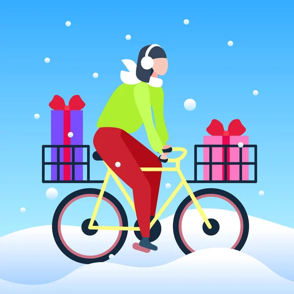 Kobieta kolarz ride rower transport pudełeczka zimą śniegu Wesołych Świąt szczęśliwego nowego roku koncepcja płaskie — Wektor stockowy