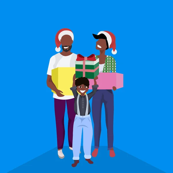 Afroamerikanska familjen hålla gåva rutan närvarande god jul gott nytt år holiday konceptet platt — Stock vektor