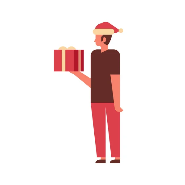 Mann halten Geschenkbox Geschenk frohe Weihnachten glücklich neues Jahr Feiertag Feier Konzept volle Länge männlichen Zeichentrickfigur isoliert flach — Stockvektor