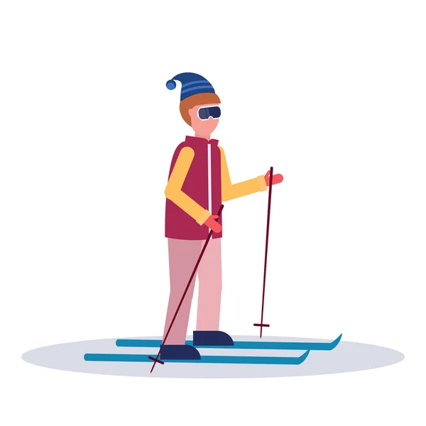 Man skiing sport activities guy wearing goggles ski suit male carton character sportsman on skis full length profile flat isolated — Stock Vector