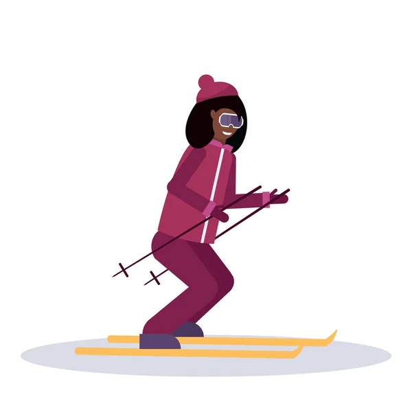 Woman skiing sport activities lady wearing goggles ski suit female carton character sportswoman on skis full length profile flat isolated — Stock Vector