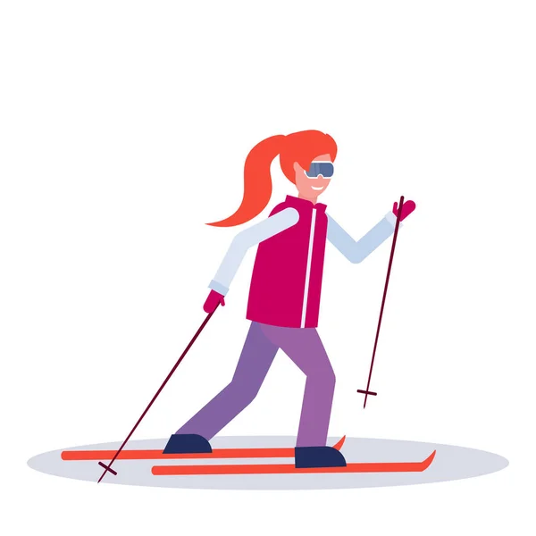 Woman skiing sport activities lady wearing goggles ski suit female carton character sportswoman on skis full length profile flat isolated — Stock Vector