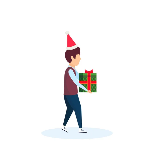 Chłopiec ubrany kapelusz gospodarstwa prezent pole szczęśliwego nowego roku merry christmas koncepcja kreskówka mężczyzna postać profil pełnej długości na białym tle — Wektor stockowy