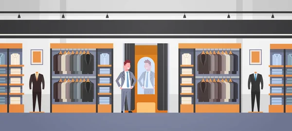 Homem de negócios tentando em novo terno de negócios homem elegante olhando espelho loja de moda mercado de roupas masculinas moderno shopping interior plano horizontal —  Vetores de Stock