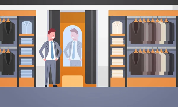 Zakenman proberen op nieuwe pak elegante zakenman kijken spiegel mode winkel mannelijke kleding markt moderne winkelcentrum interieur vlak en horizontaal — Stockvector